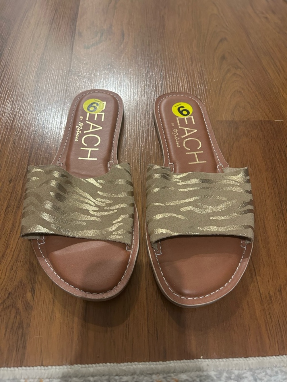 Gold zebra slides